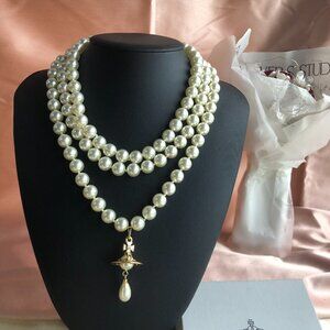 Brand new Vivienne Westwood Three Row Pearl Bas Relief Choker in Gold